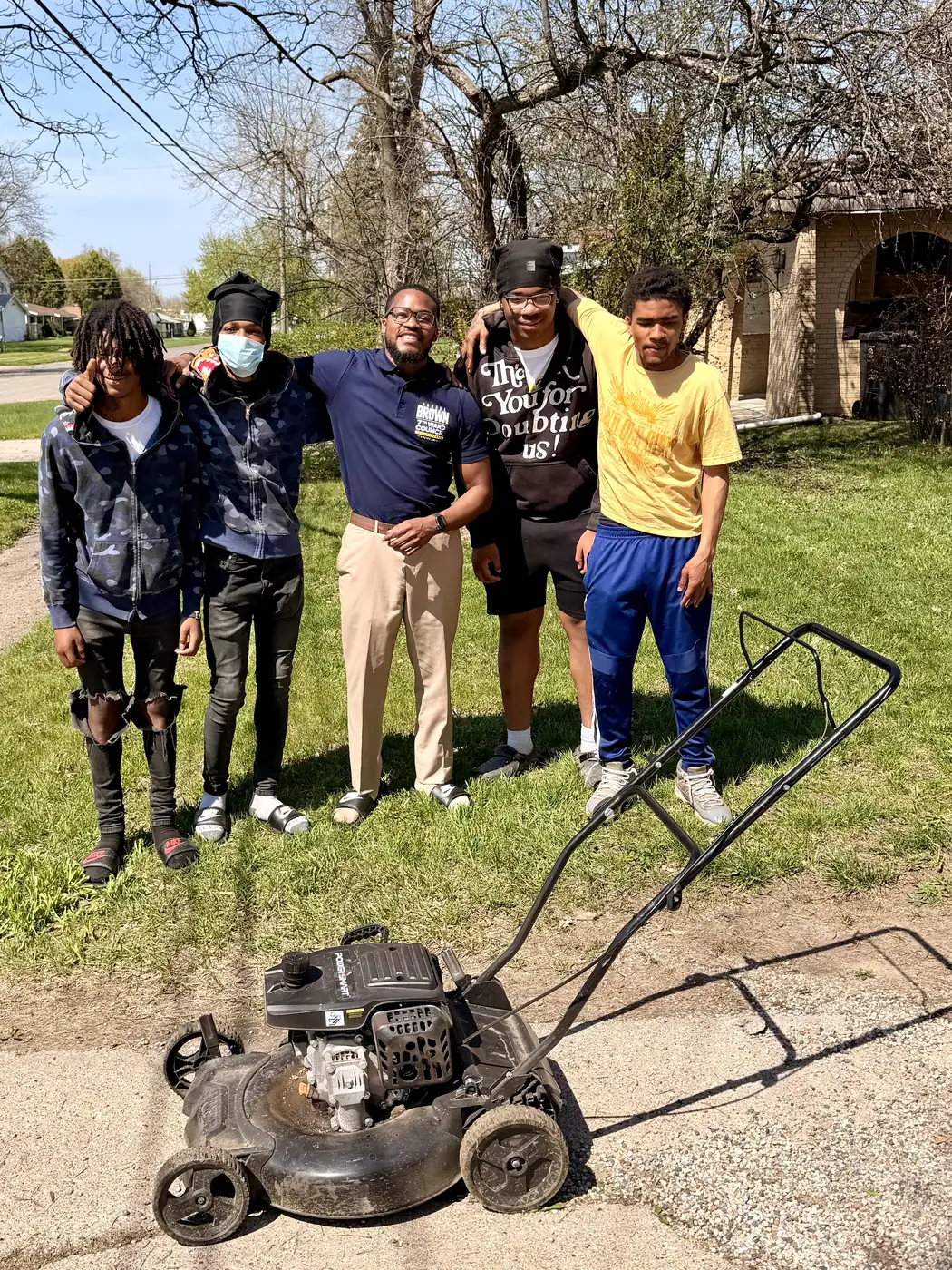 Darell Brown and volunteers completing neighborhood yard work