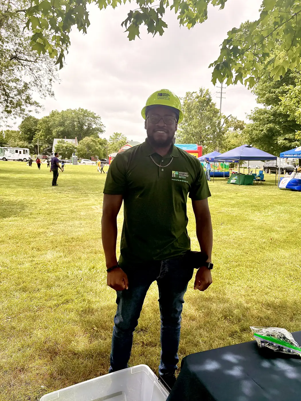 Darell Brown volunteering at an outdoor neighborhood event