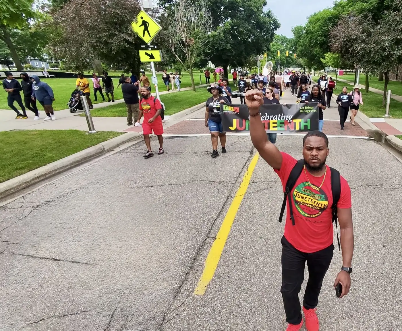 Darell Brown participating in a neighborhood march