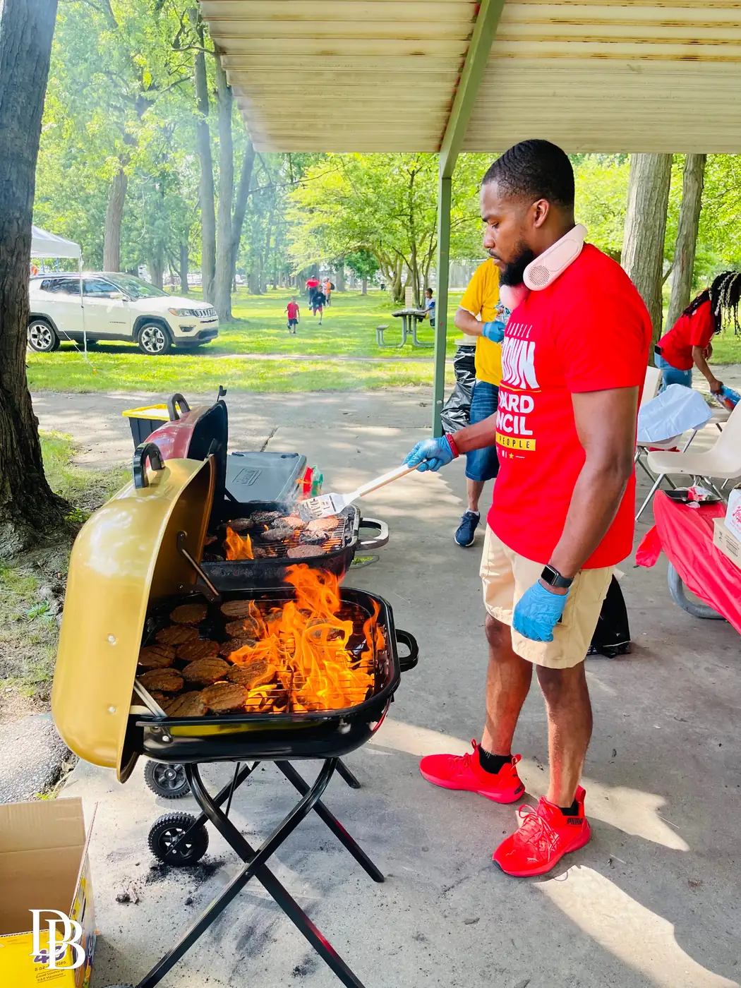Darell Brown cooking at a neighborhood gathering