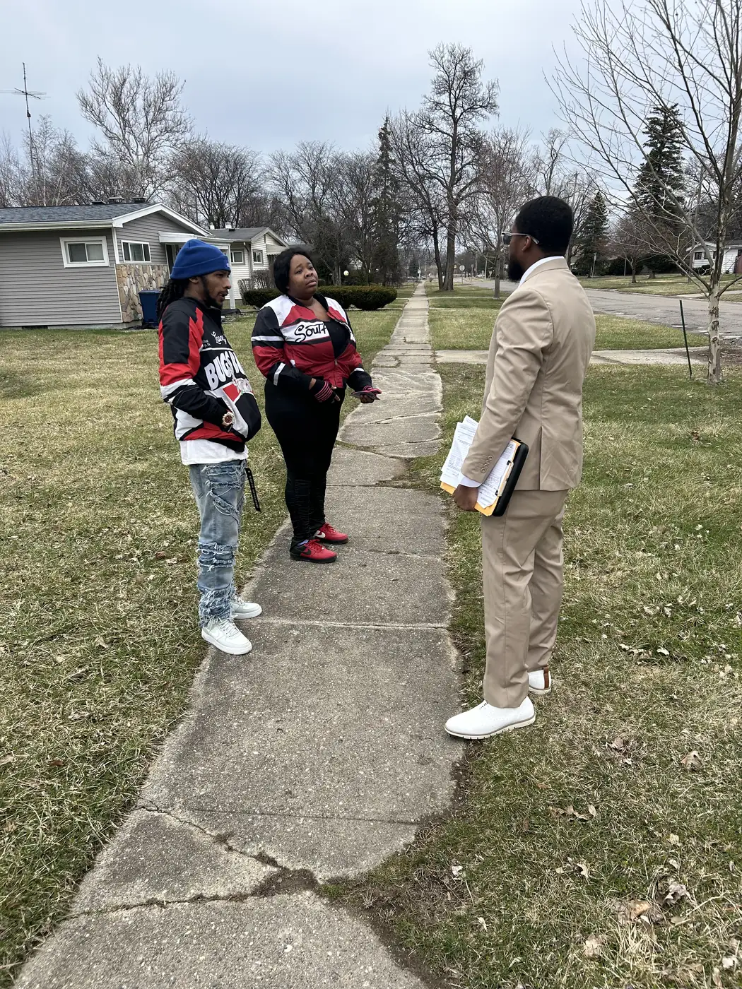 Darell Brown connecting with young residents outdoors