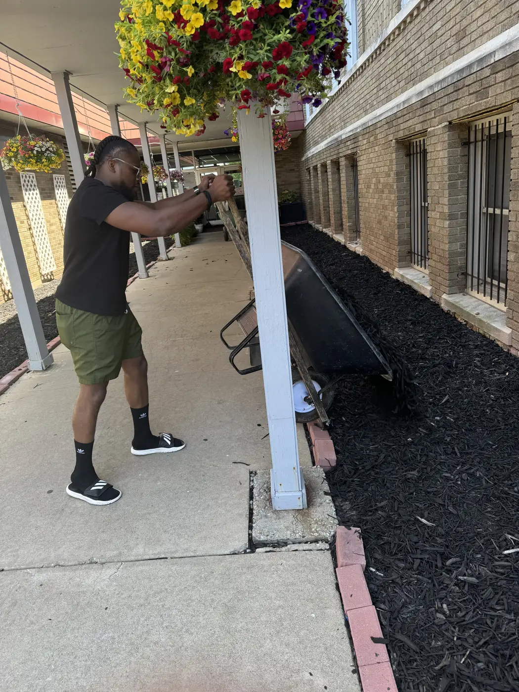 Darell Brown helping with a neighborhood improvement project