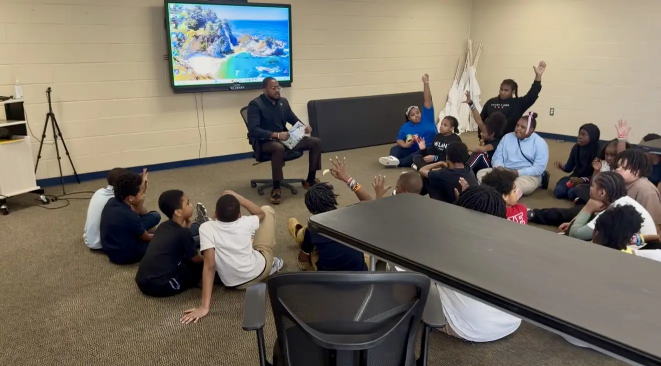 Residents participating in a workshop led by Darell Brown