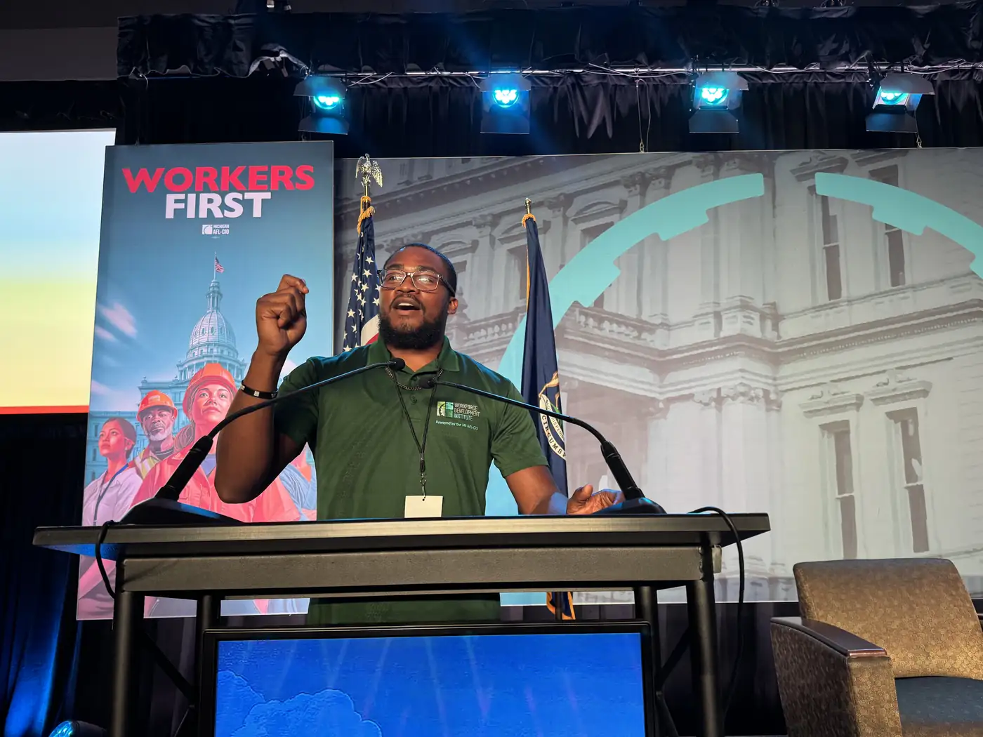 Darell Brown speaking from a community stage