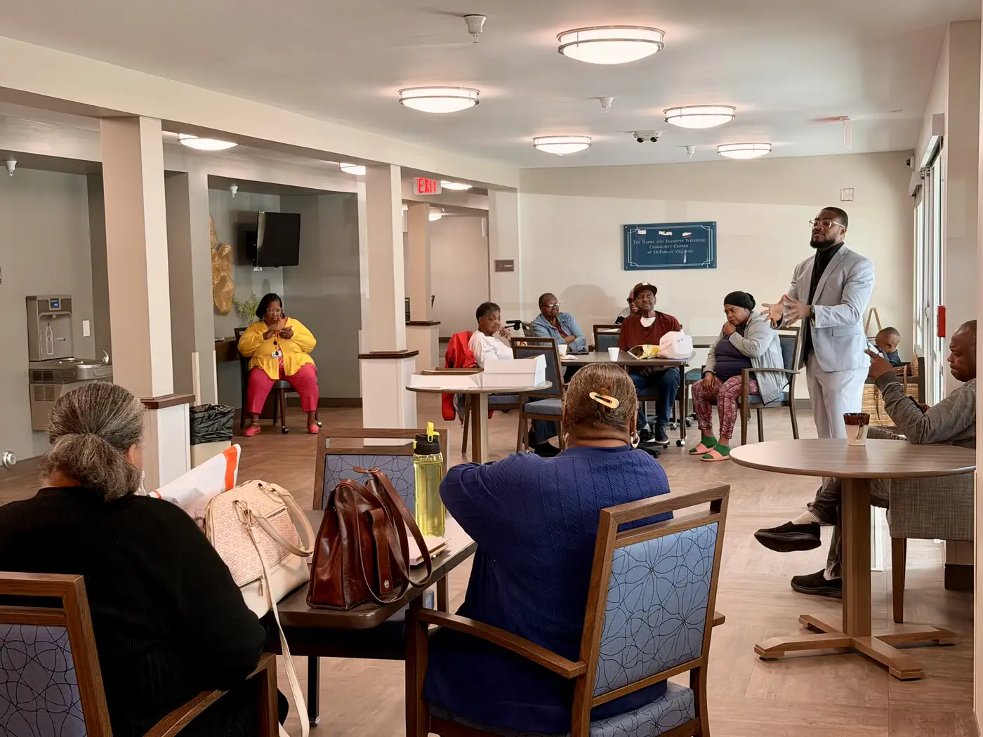 Darell Brown speaking with residents at a senior community
