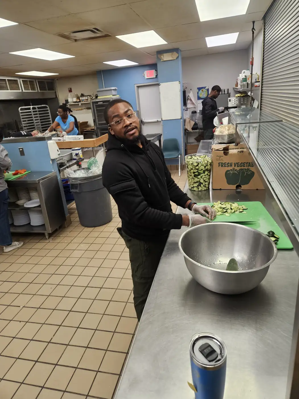 Darell Brown preparing food in a commercial kitchen