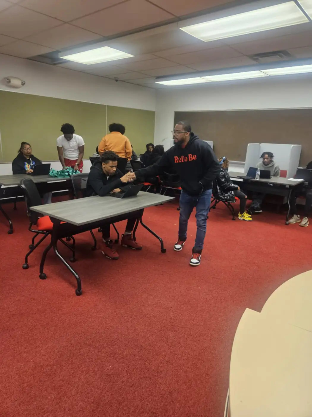 Darell Brown joining residents for a community roundtable
